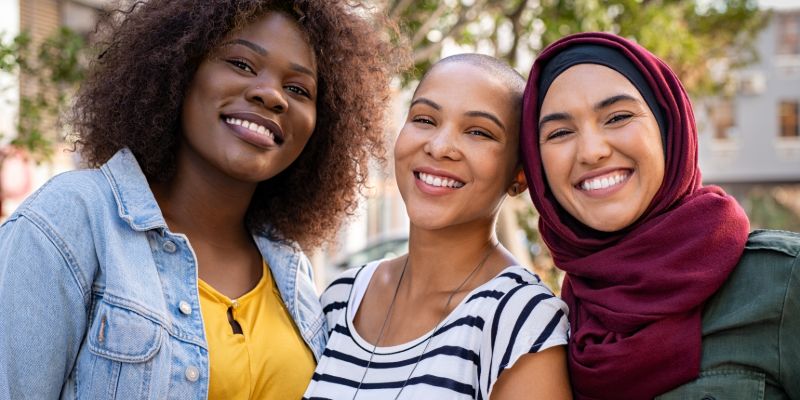 three women smiling