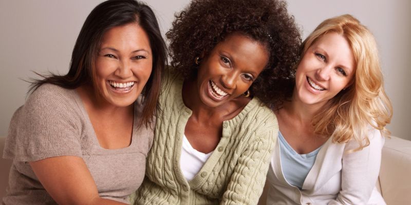 three women smiling