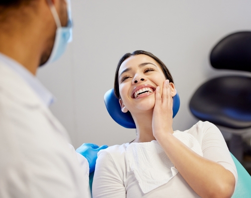 Woman,,Dentist,And,Happy,For,Dental,Surgery